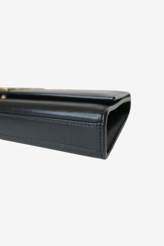 Saint Laurent Leather Cassandre Clutch - Designer clutch at The Find Luxury Resale - Vancouver, Canada