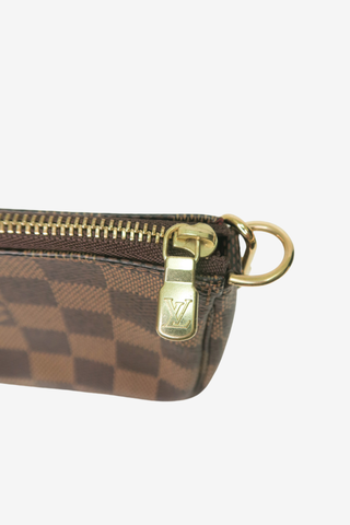 Louis Vuitton Damier Ebene Mini Pochette - Designer handbag at The Find Luxury Resale - Vancouver, Canada