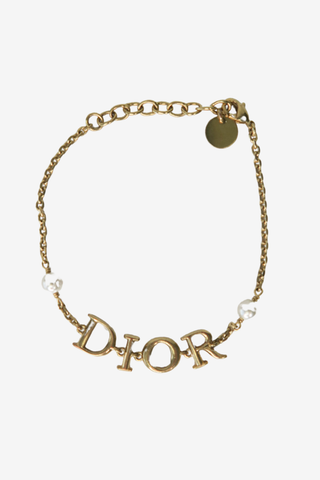 Christian Dior Logo Bracelet - Designer Earrings at The Find Luxury Resale - Vancouver, Canada