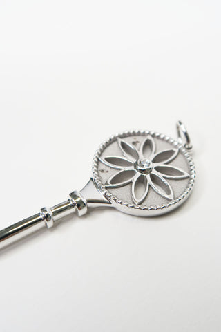 Tiffany & Co. White Gold Diamond Daisy Key Pendant 2.5" - Designer Necklaces at The Find Luxury Resale - Vancouver, Canada