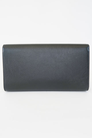 Saint Laurent Leather Clutch - Designer Handbags at The Find Luxury Resale - Vancouver, Canada