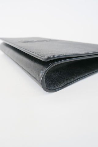 Saint Laurent Leather Clutch - Designer Handbags at The Find Luxury Resale - Vancouver, Canada