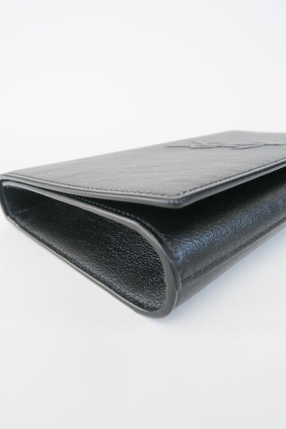 Saint Laurent Leather Clutch - Designer Handbags at The Find Luxury Resale - Vancouver, Canada