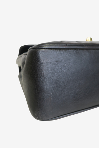 Chanel Verticle Quilt Jumbo Flap Vintage - Designer Handbags at The Find Luxury Resale - Vancouver, Canada