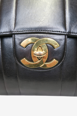 Chanel Verticle Quilt Jumbo Flap Vintage - Designer Handbags at The Find Luxury Resale - Vancouver, Canada