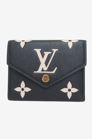 Louis Vuitton Monogram Giant Pattern Empreinte Leather Victorine Wallet - Designer wallet at The Find Luxury Resale - Vancouver, Canada