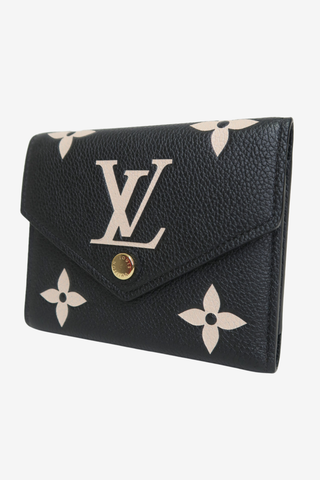 Louis Vuitton Monogram Giant Pattern Empreinte Leather Victorine Wallet - Designer wallet at The Find Luxury Resale - Vancouver, Canada