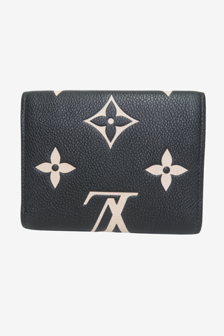 Louis Vuitton Monogram Giant Pattern Empreinte Leather Victorine Wallet - Designer wallet at The Find Luxury Resale - Vancouver, Canada