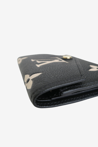 Louis Vuitton Monogram Giant Pattern Empreinte Leather Victorine Wallet - Designer wallet at The Find Luxury Resale - Vancouver, Canada