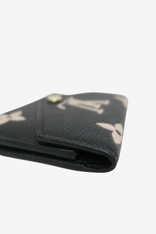 Louis Vuitton Monogram Giant Pattern Empreinte Leather Victorine Wallet - Designer wallet at The Find Luxury Resale - Vancouver, Canada