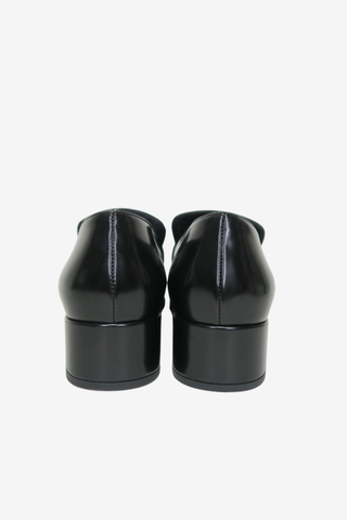 Prada Metal Triangle Leather Loafers sz 38 - Designer Loafer at The Find Luxury Resale - Vancouver, Canada