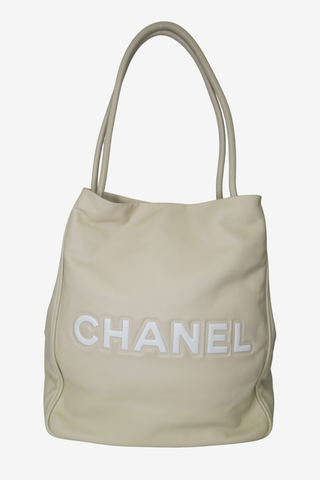Chanel Beige Lambskin Camellia Tote - Designer Handbags at The Find Luxury Resale - Vancouver, Canada
