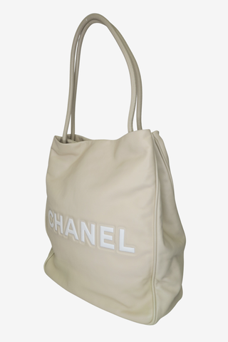 Chanel Beige Lambskin Camellia Tote - Designer Handbags at The Find Luxury Resale - Vancouver, Canada