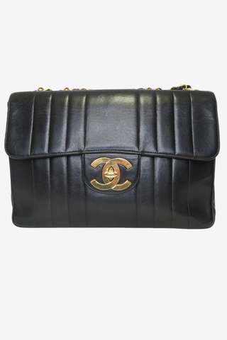Chanel Verticle Quilt Jumbo Flap Vintage - Designer Handbags at The Find Luxury Resale - Vancouver, Canada