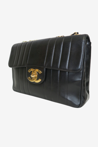 Chanel Verticle Quilt Jumbo Flap Vintage - Designer Handbags at The Find Luxury Resale - Vancouver, Canada