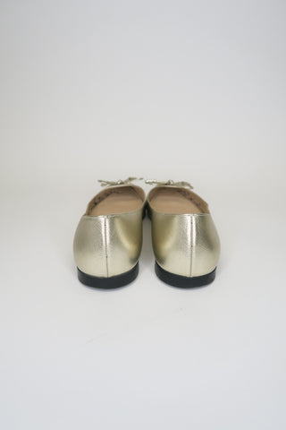 Prada Gold Leather Flats sz 35.5 - Designer Flats at The Find Luxury Resale - Vancouver, Canada