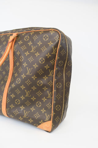 Louis Vuitton Monogram Sirus 24 - Designer Handbags at The Find Luxury Resale - Vancouver, Canada