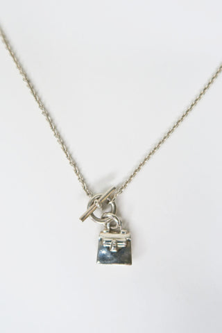 Hermès Amulettes Kelly Pendant Necklace - Designer Necklaces at The Find Luxury Resale - Vancouver, Canada