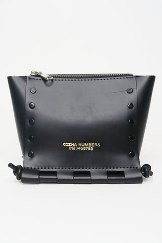 Kozha Numbers Leather Shoulder Bag - Designer Handbags at The Find Luxury Resale - Vancouver, Canada