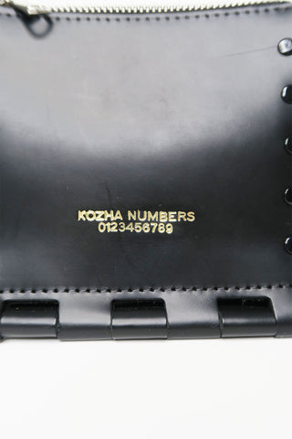 Kozha Numbers Leather Shoulder Bag