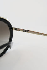 Prada Round Tinted Sunglasses